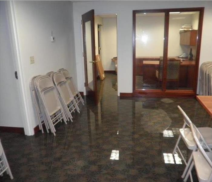 water covering floor in office, 1 inch deep