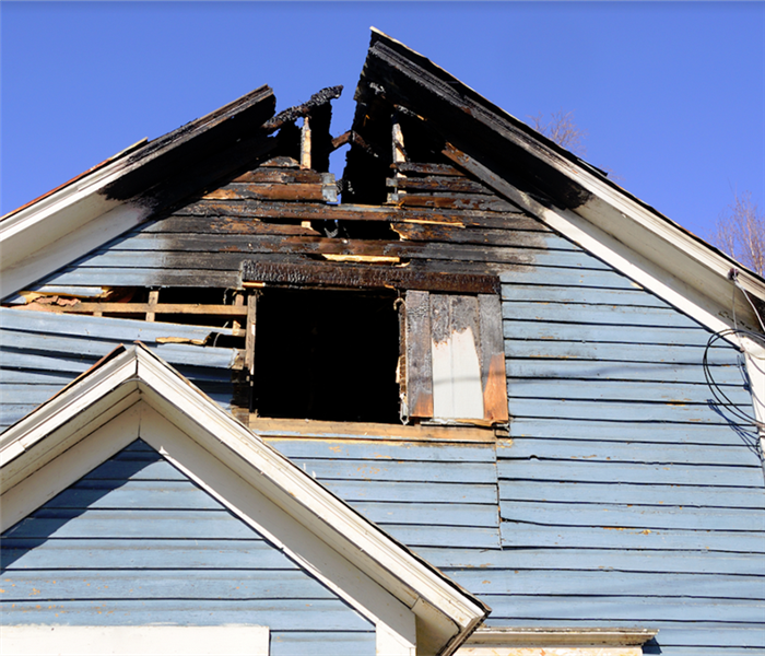 exterior of a fire damaged house